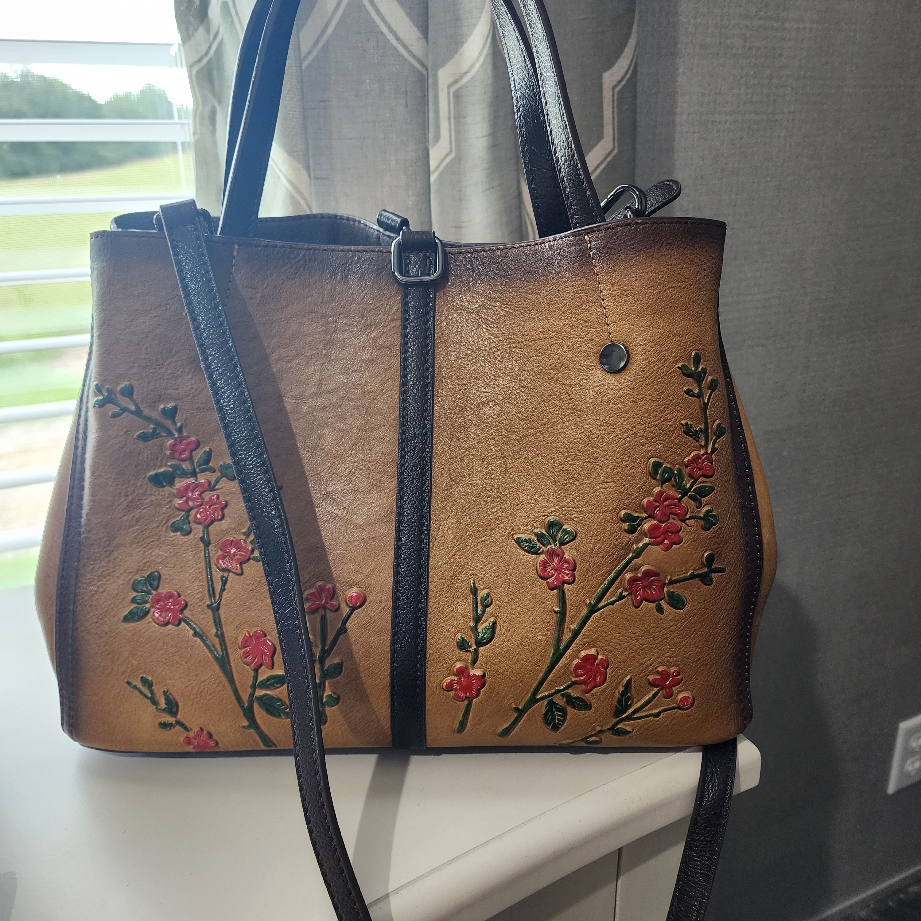 Chic Tan Leather Shoulder Bag With Floral Design